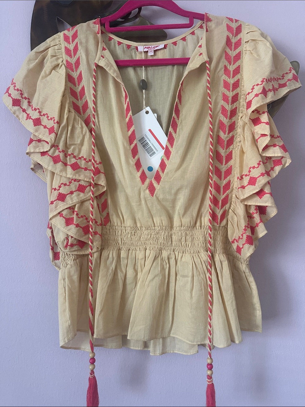 Pin-Up Stars Cream Peplum Blouse with Pink Embroidery and Tassel Ties - Picture 5 of 6